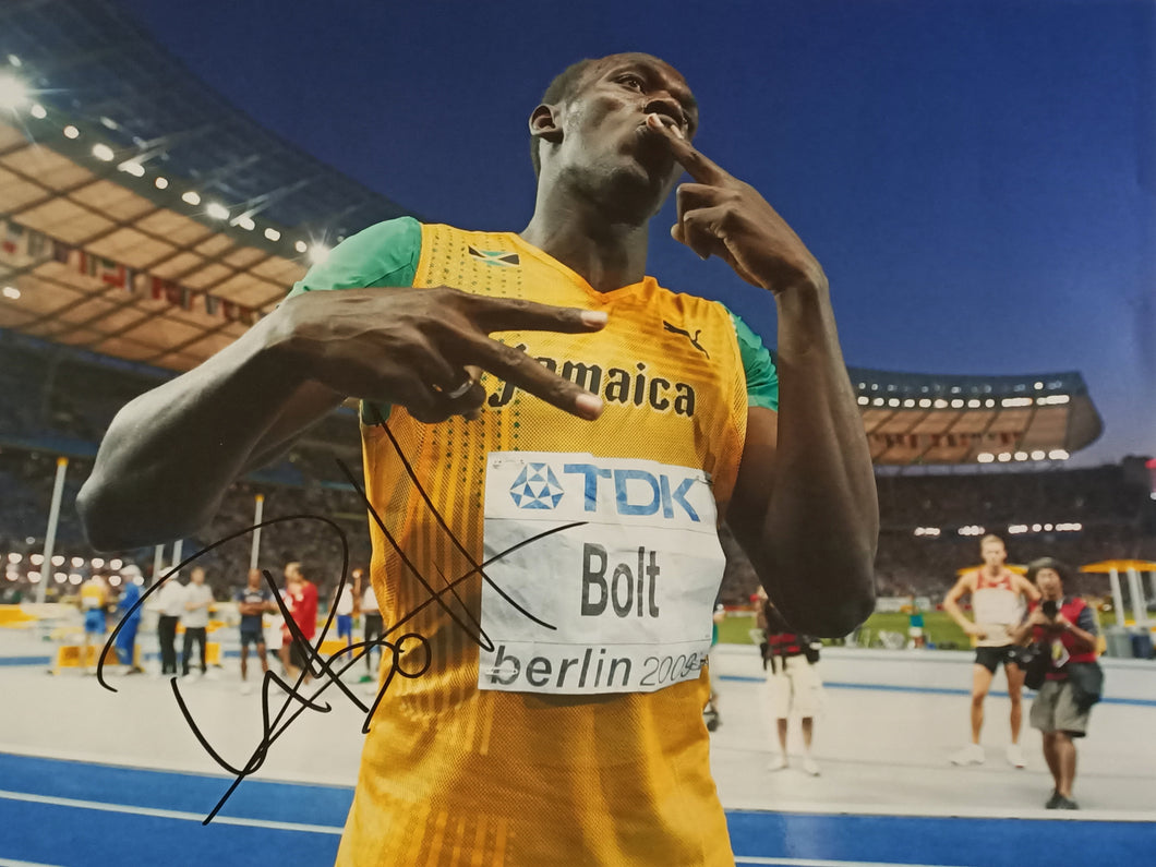 Usain Bolt Berlin Olympics 2009 signed photo. COA - Heroes Framing & Memorabilia